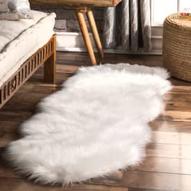 Ivory sheepskin throw hot sale